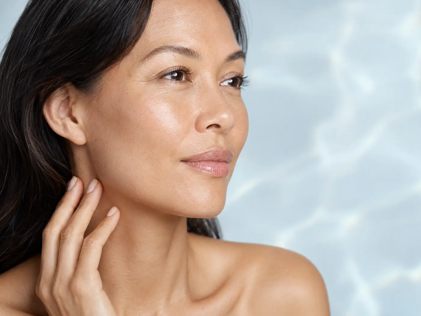 Adult woman with naturally radiant-looking skin